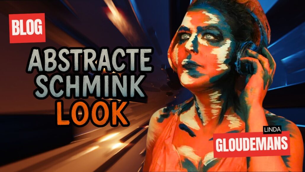 Abstracte schmink look met oranje, blauw en wit, ontworpen door Linda Gloudemans – te zien in de blog op SchminkenGrime.nl