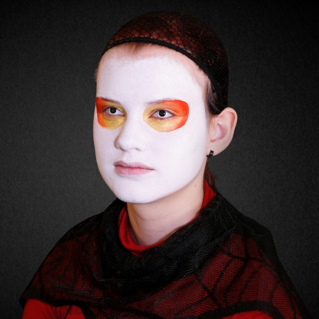 Goud, oranje en rood rond de ogen bij Day of the Dead schmink, verkrijgbaar bij SchminkenGrime.nl