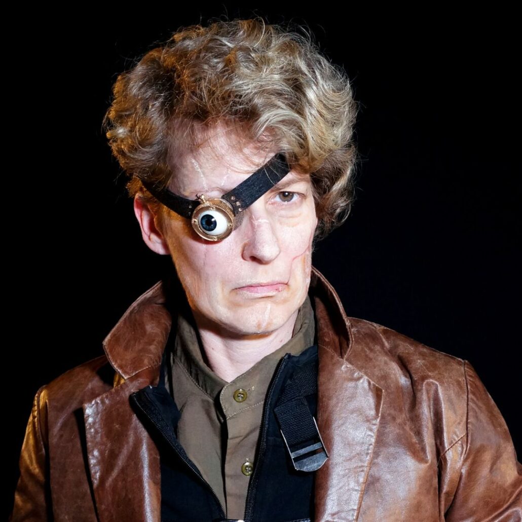 Mad-Eye Moody look met littekens en kunstoog in close-up, Halloween schmink voorbeeld, verkrijgbaar bij SchminkenGrime.nl
