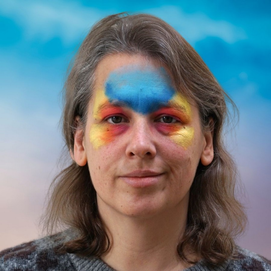 Blauwe achtergrond aangebracht op het voorhoofd voor dolfijn kinder schmink, verkrijgbaar bij SchminkenGrime.nl