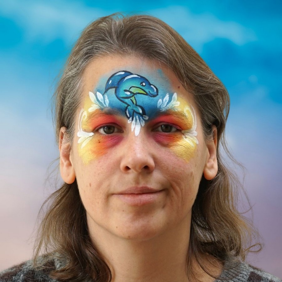 Druppels en krullen aangebracht met wit bij dolfijn kinder schmink, verkrijgbaar bij SchminkenGrime.nl