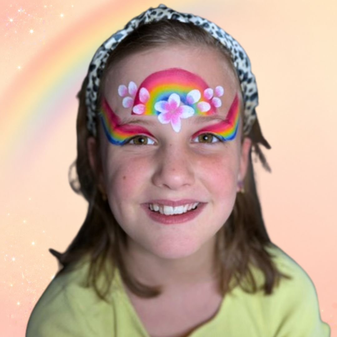 Progress-shot van het regenboogdesign halverwege, met de twee regenbogen en de eerste bloem-toetsen zichtbaar, verkrijgbaar bij SchminkenGrime.nl.
