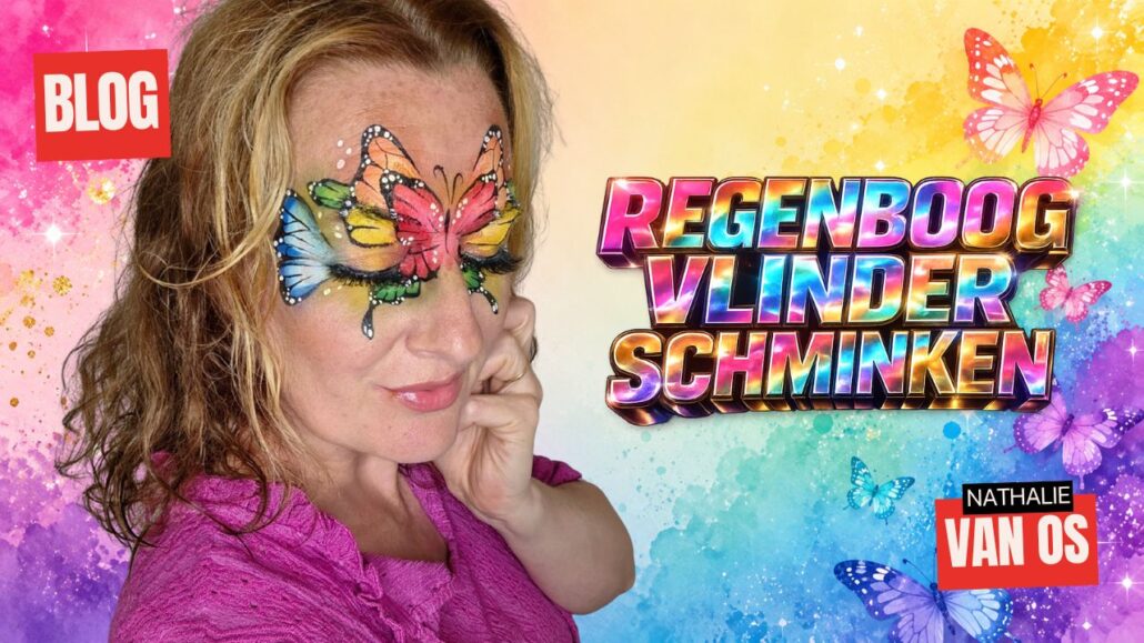 Vrolijke regenboog vlinder als oogmasker geschminkt rond beide ogen en op het voorhoofd, met blauwe, groene, oranje, gele en rode vleugels, zwart lijnwerk en witte stippen, verkrijgbaar bij SchminkenGrime.nl.