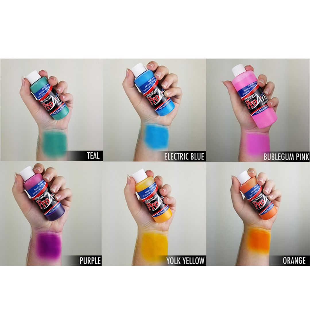 ProAiir Hybrid Tropical Pack 6×30ml – Swatch van tropische airbrush kleuren, verkrijgbaar bij SchminkenGrime.nl ProAiir Hybrid Tropical Pack met 6 tropische kleuren geswatched op de huid, watervaste airbrush schmink op alcoholbasis voor kleurrijke face- en bodypaint, verkrijgbaar bij SchminkenGrime.nl