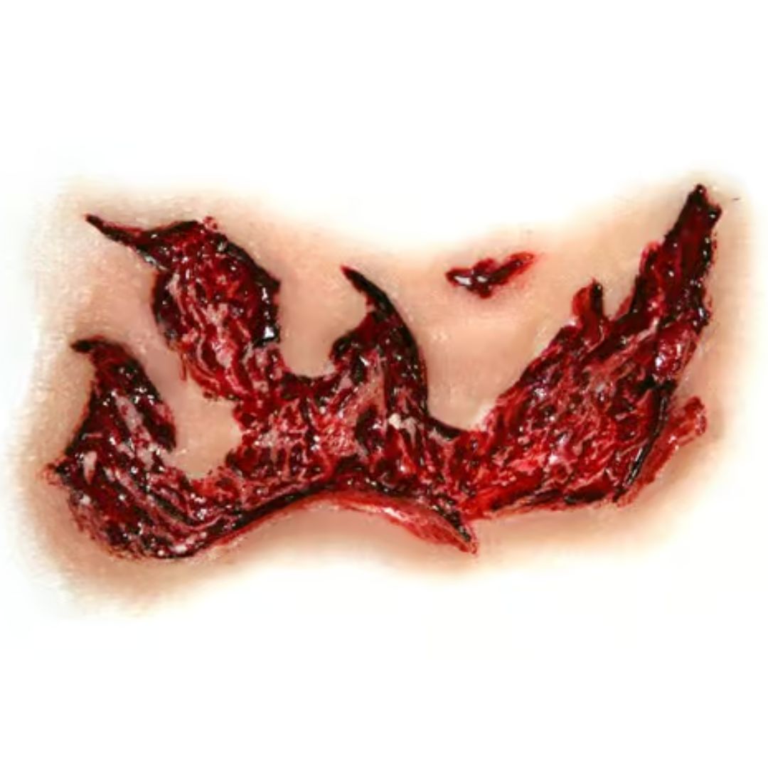 Tinsley Transfers Ripped Flesh FX Transfer close-up | SchminkenGrime.nl Close-up Tinsley Transfers Ripped Flesh 3D FX Transfer met gescheurde huidstructuur, verkrijgbaar bij SchminkenGrime.nl