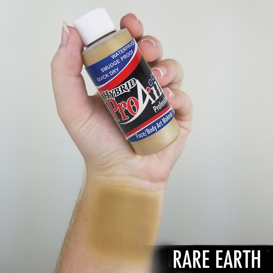 ProAiir Hybrid Rare Earth – arm swatch van de warme bruintint airbrush schmink ProAiir Hybrid Rare Earth arm swatch toont warme aardetint, watervaste airbrush schmink met natuurlijke uitstraling, geschikt voor camouflage of huidtonen, verkrijgbaar bij SchminkenGrime.nl