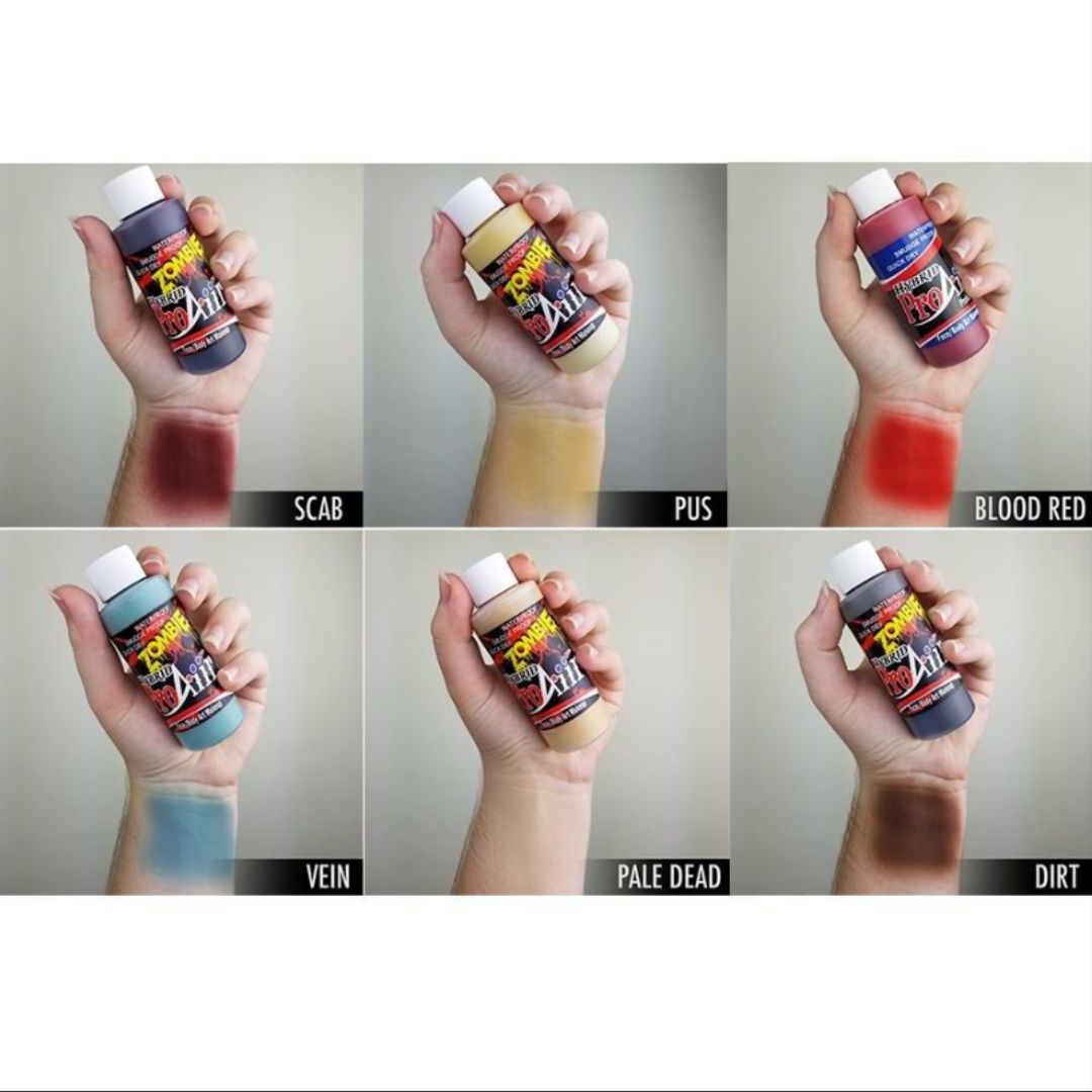 ProAiir Zombie Pack 2 – swatches van airbrush schmink (6x30ml), verkrijgbaar bij SchminkenGrime.nl Swatches op arm van ProAiir Hybrid Zombie Pack 2, 6x30ml, watervaste airbrush schmink in dode, viezige en levenloze tinten zoals groen, grijs en paars, ideaal voor zombielooks en SFX, verkrijgbaar bij SchminkenGrime.nl