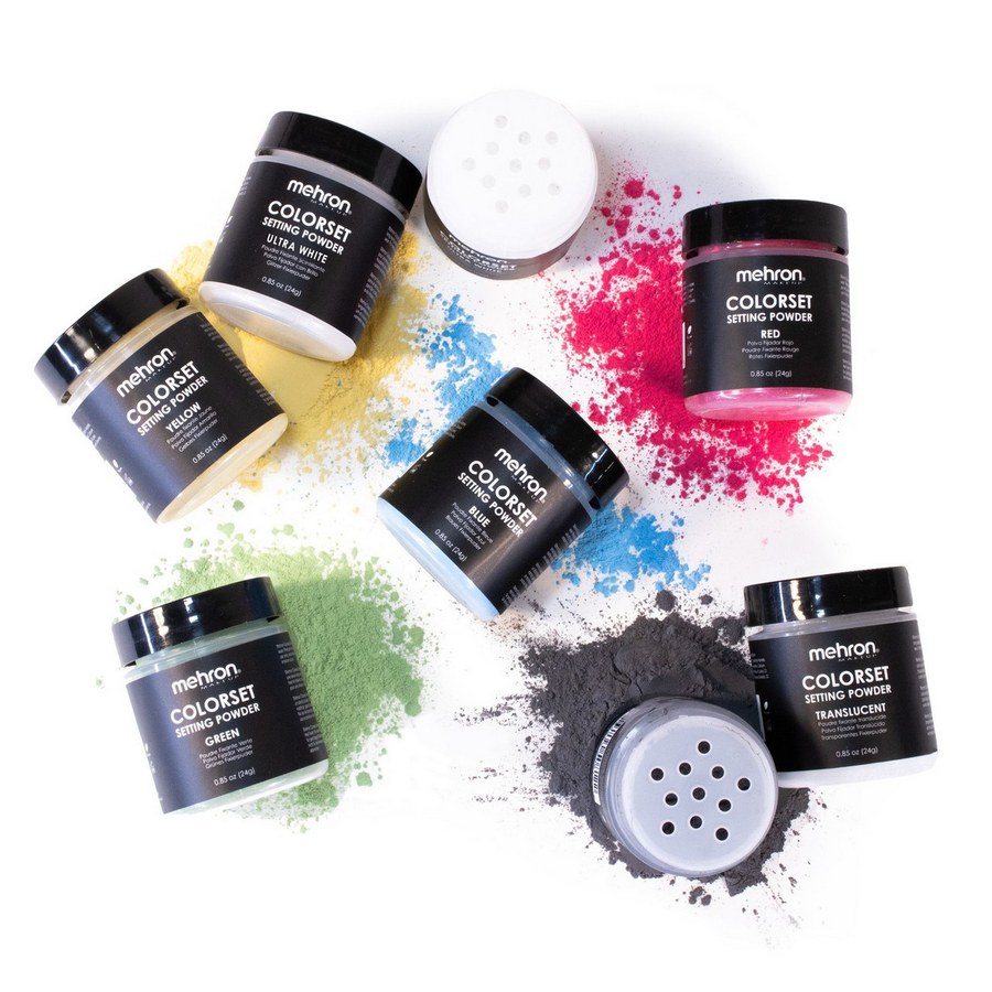 Complete Mehron Colorset Powder Bold serie met potjes in geel, rood, blauw, groen, wit, zwart en transparant tussen kleurige poederwolken.