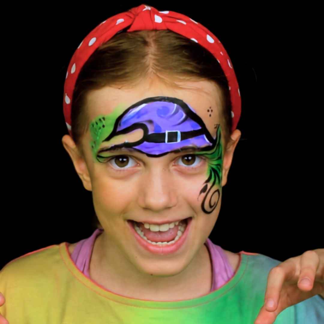 Halloween face paint for kids: purple witch hat design