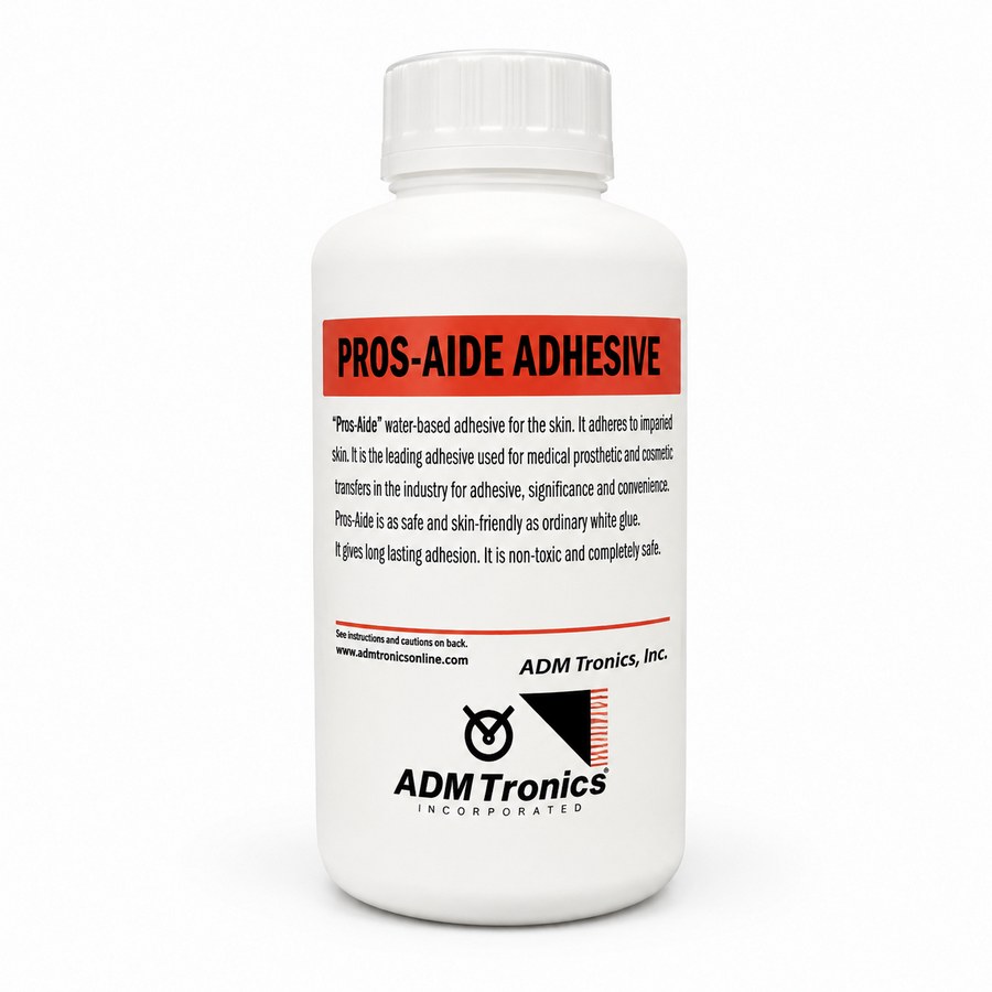 Pros-Aide Adhesive huidlijm in witte fles met rode productlabel voor het bevestigen van protheses en special effects make-up, verkrijgbaar bij SchminkenGrime.nl