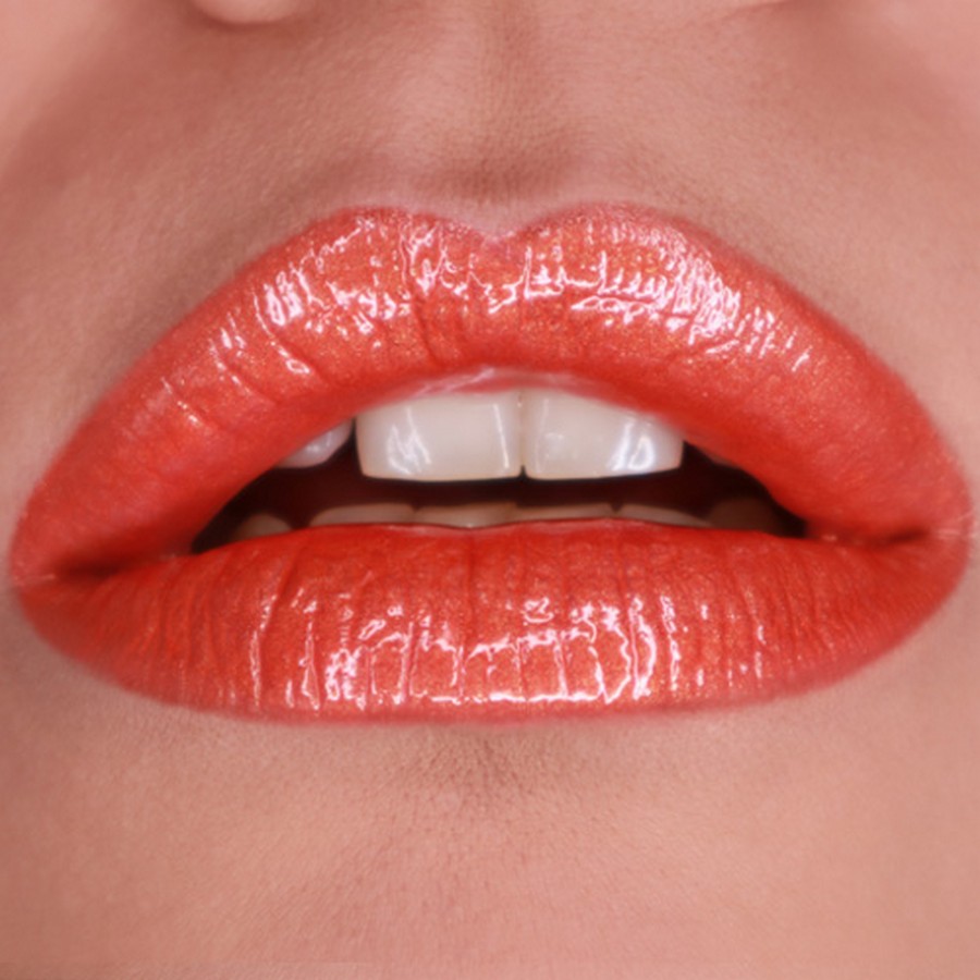 Grimas Lipgloss Orange Zest op de lippen, verkrijgbaar bij SchminkenGrime.nl