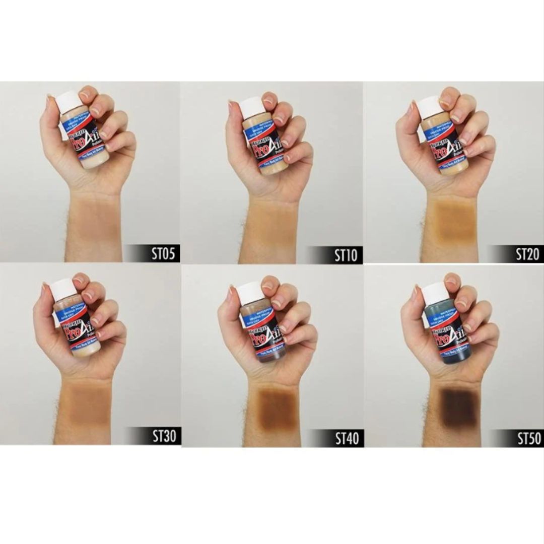 ProAiir Hybrid Skintone Pack 6×30ml, watervaste airbrush schmink met huidswatches, verkrijgbaar bij SchminkenGrime.nl ProAiir Hybrid Skintone Pack met 6 watervaste airbrush schminkkleuren, van ST05 tot ST50, geswatcht op de arm, ideaal voor realistische huidtonen in face- en bodypaint, verkrijgbaar bij SchminkenGrime.nl