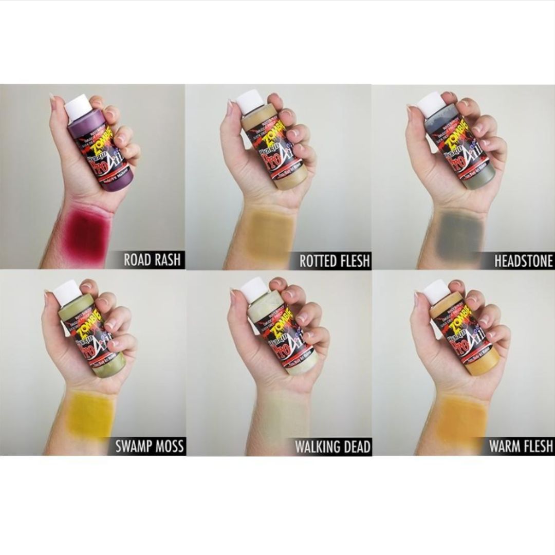 ProAiir Zombie Pack 1 – swatches van airbrush schmink (6x30ml), verkrijgbaar bij SchminkenGrime.nl Swatches op arm van ProAiir Hybrid Zombie Pack 1, 6x30ml, watervaste airbrush schmink in zombie-achtige kleuren zoals blauw, grijs, paars en huidskleuren, ideaal voor SFX make-up, verkrijgbaar bij SchminkenGrime.nl