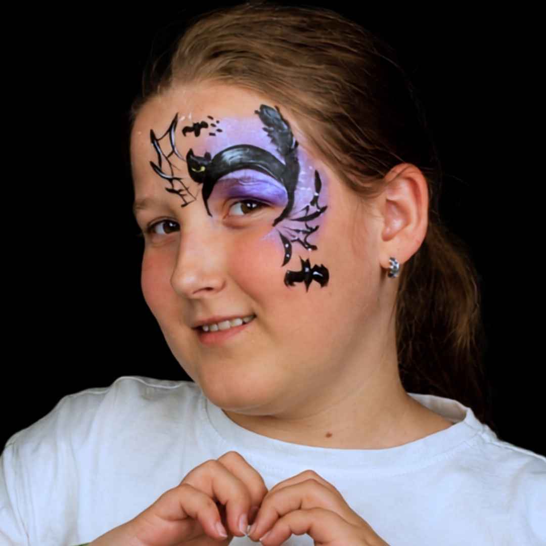 Halloween face paint for kids: black cat with web