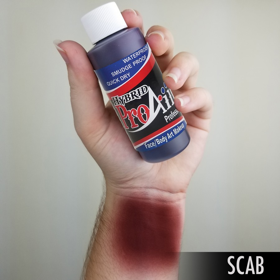 ProAiir Hybrid Scab arm swatch toont donkerrode korstkleur, ideaal voor SFX zoals wondranden en korstvorming, watervaste airbrush schmink, verkrijgbaar bij SchminkenGrime.nl