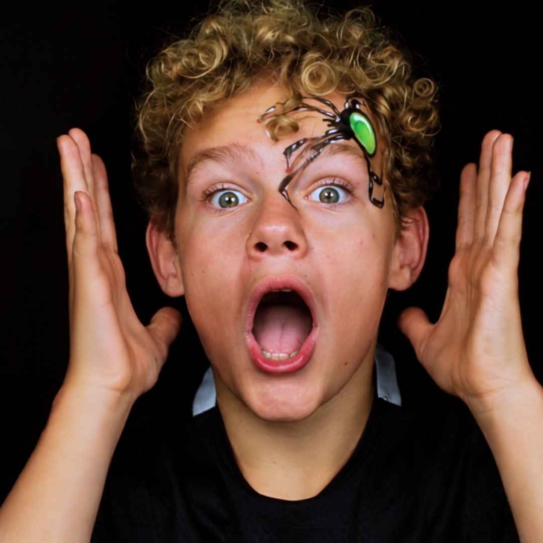 Halloween face paint for kids: spider eye design