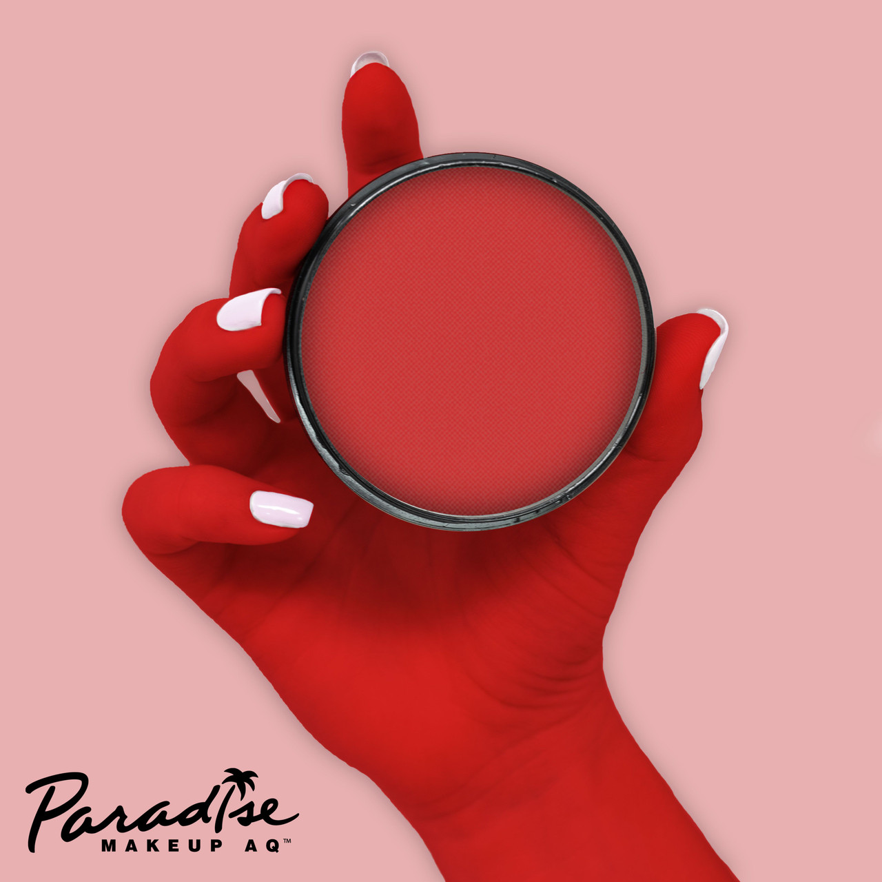 Mehron Paradise Beach Berry 40gr – schmink op hand, verkrijgbaar bij SchminkenGrime.nl Mehron Paradise Beach Berry 40 gram aangebracht op hand met verpakking erbij, laat de diepe roze-paarse kleur en dekking van de waterschmink zien, verkrijgbaar bij SchminkenGrime.nl