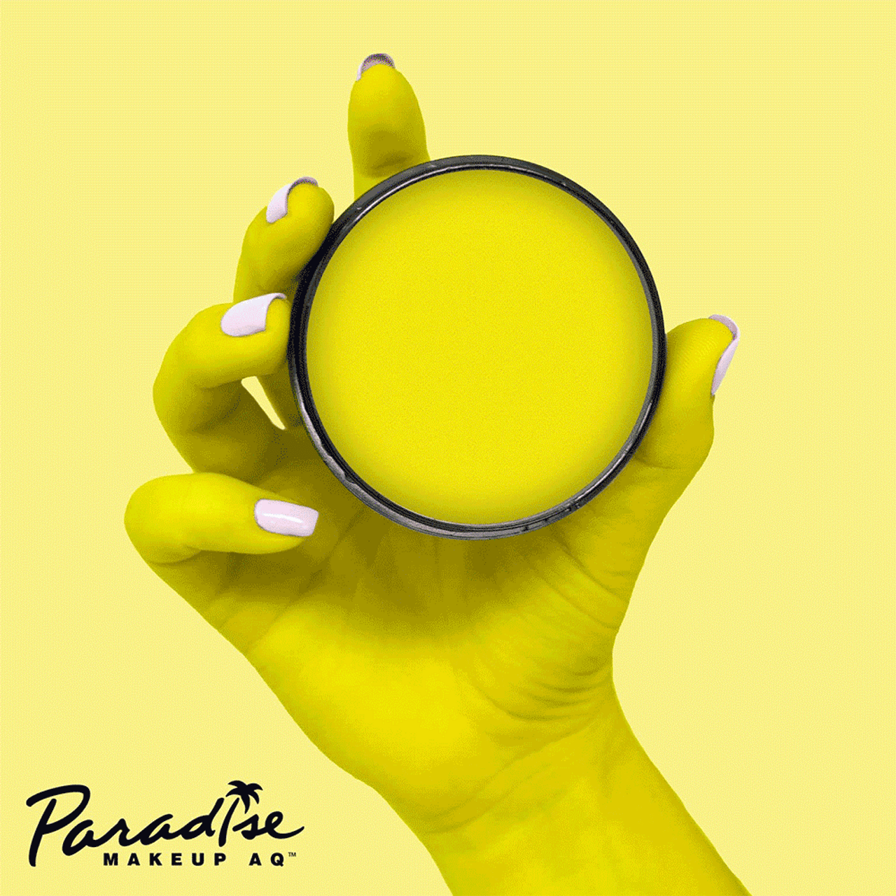 Mehron Paradise Makeup Neon UV Yellow (40g), heldergele waterschmink die fel oplicht onder blacklight, perfect voor neon designs, facepaint en feestlooks, verkrijgbaar bij SchminkenGrime.nl